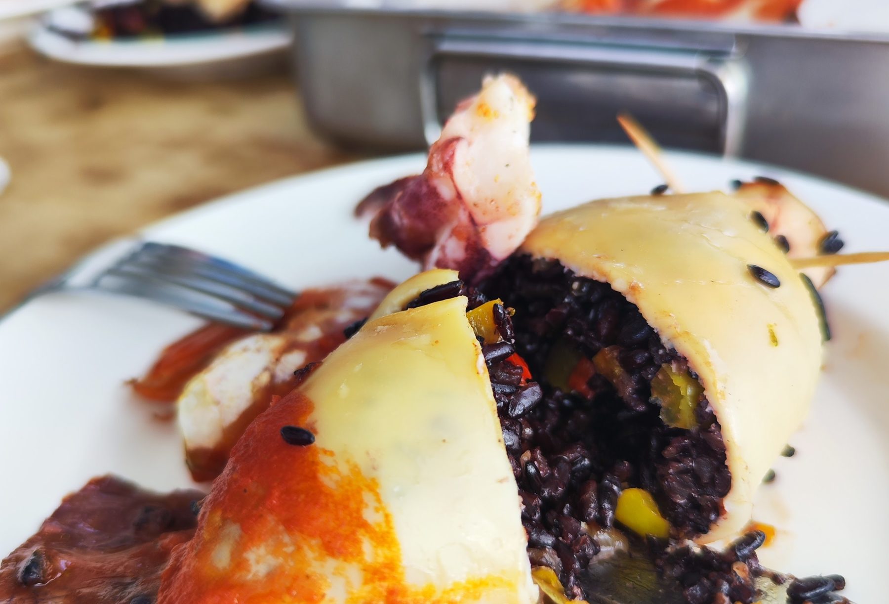 Stuffed squid with squid-ink risotto